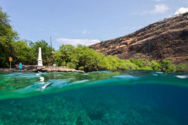 shot of the monument halfway underwater
