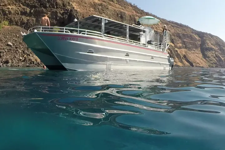 a small boat in a body of water